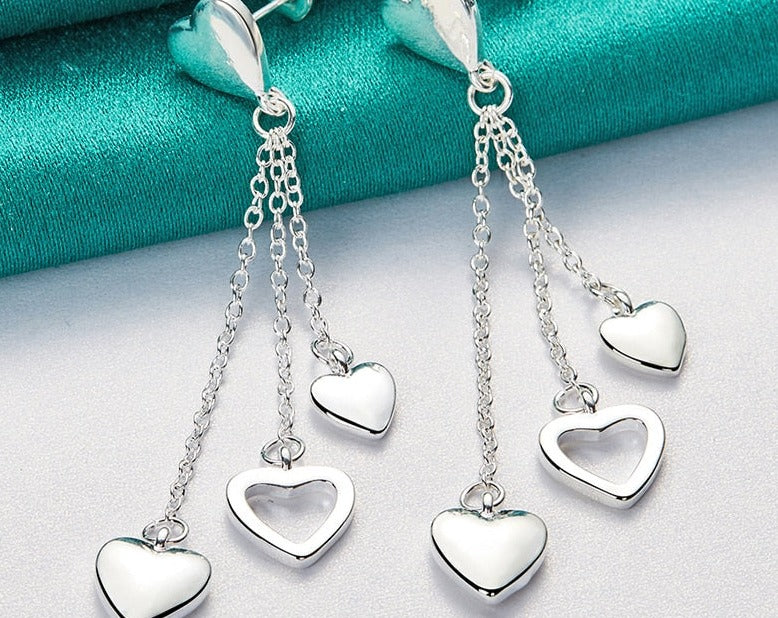 Stylish Silver Solid Hollow Heart Drop Earrings for Women [low stock]